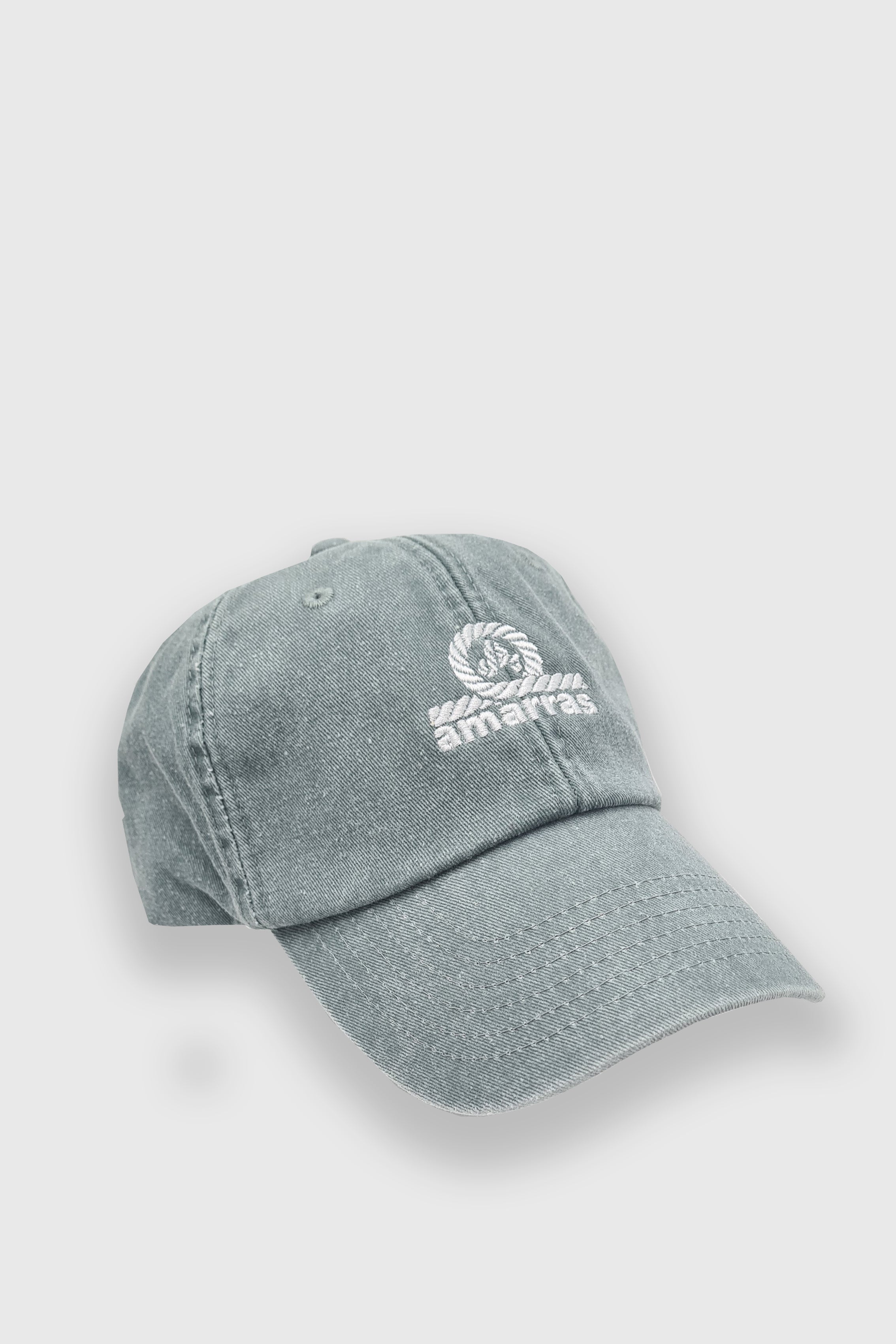 gorra amarras compass unisex en color aguamarina y logo bordado en blanco en frontal